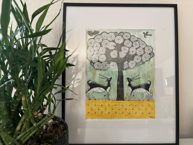 Framed original painting by Maithili Joshi: two deer beneath a white blossom tree